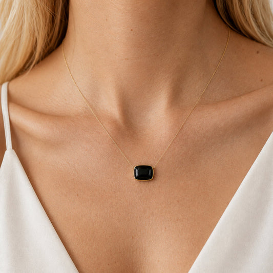 Gold Necklace 18k Notte Mediterranea essential model with black onyx worn, minimalist horizontal bar design. Italian High Jewelry Made in Italy Carlotta di Montefalco