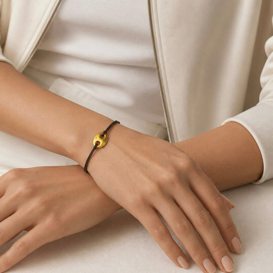 18k-gold-mariner-bracelet-black-cord-with-central-element-carlotta-di-montefalco.jpg
