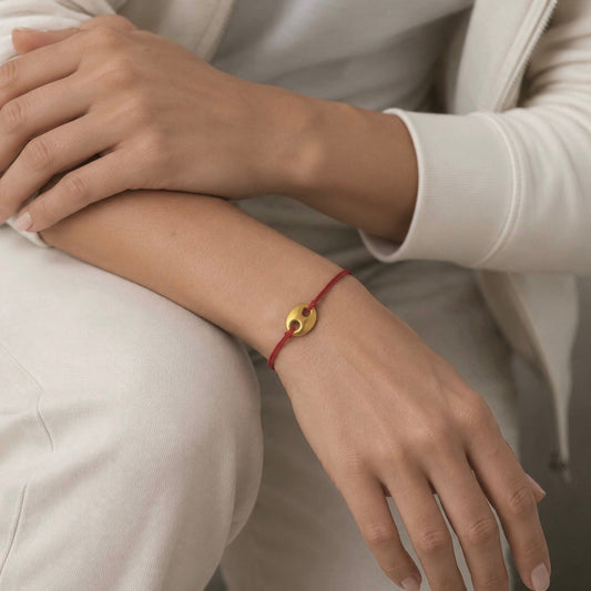 18k gold central element on red cord Mariner bracelet, clean minimalist styling. Italian High Jewelry Made in Italy Carlotta di Montefalco
