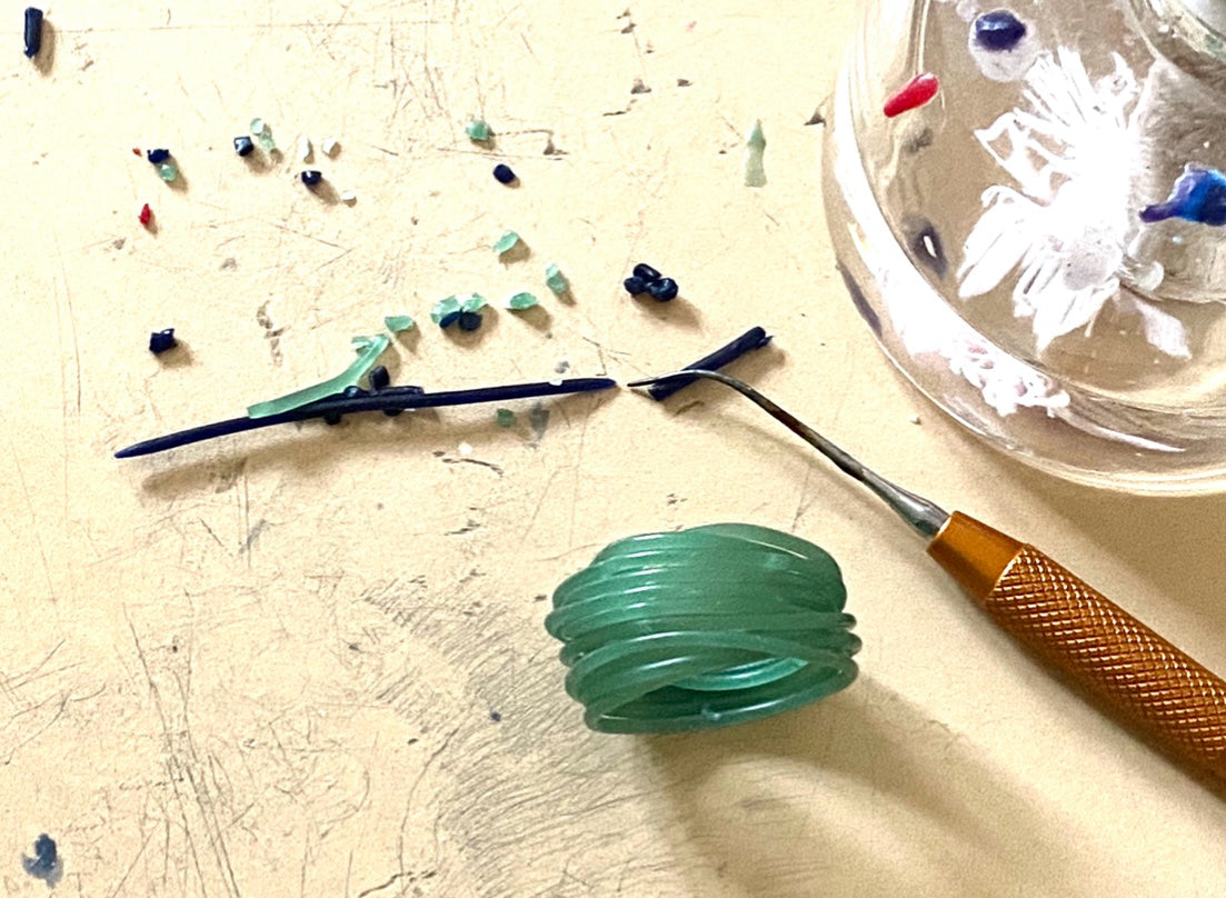 Wax model on a jeweler’s workbench during the handcrafted jewelry design process by Carlotta di Montefalco